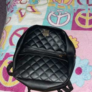 •black mini backpack•